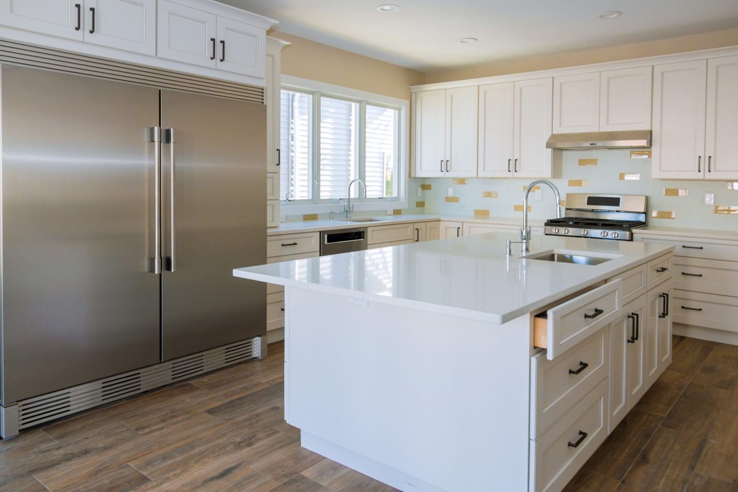 A custom kitchen remodel with new base cabinets and an island